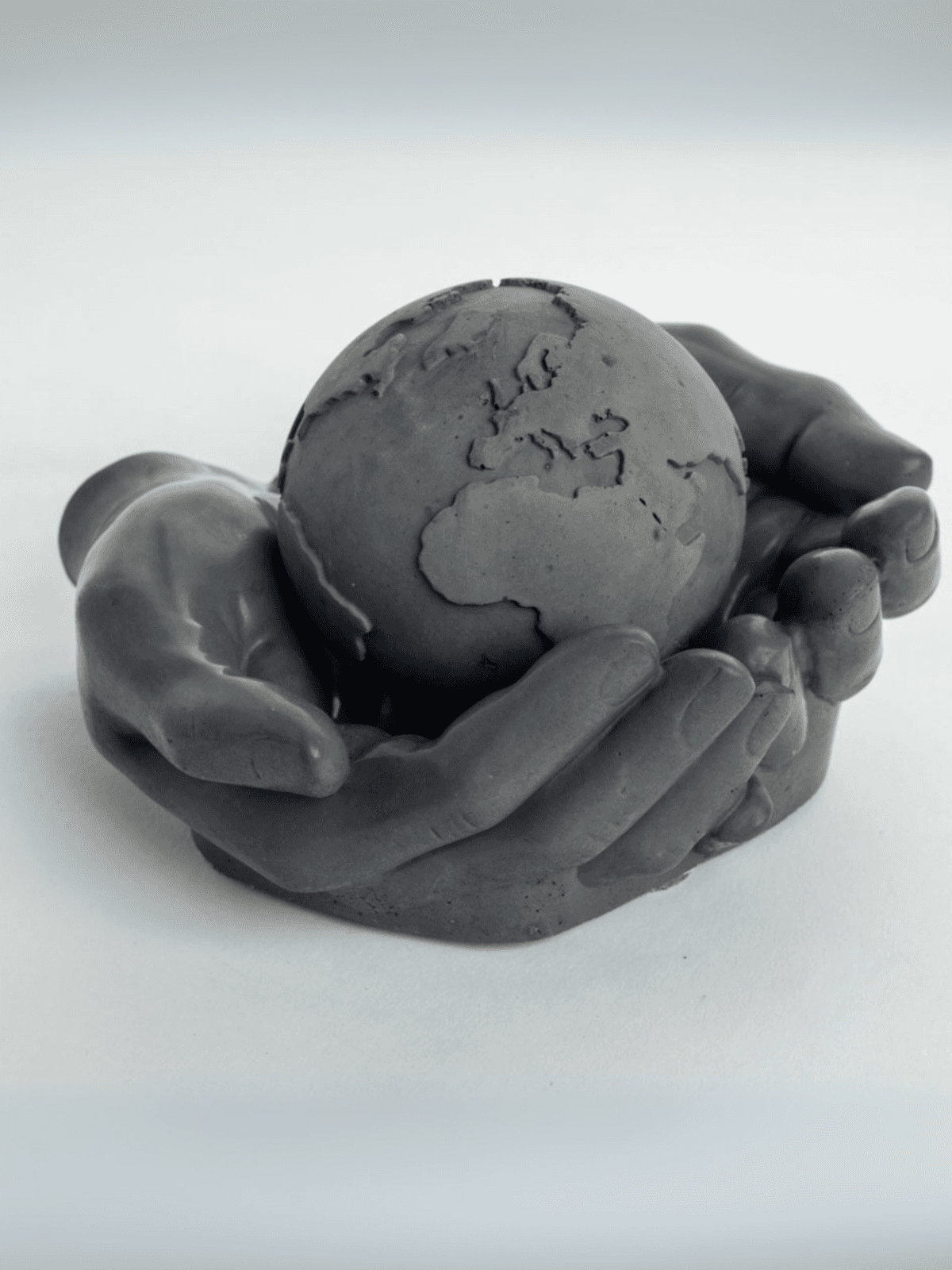 Hands Holding Earth